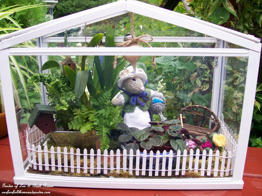 Miss Millicent Mouse in her greenhouse. https://lolajack.jp.net/featured-artist-bonnie-johnson-fabric-artist/