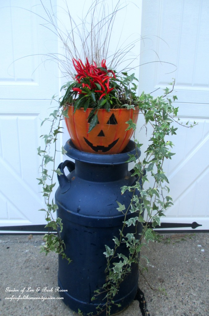 Fall planter on a milk can stand https://lolajack.jp.net/fall-outdoor-decor-our-fairfield-home-and-garden/